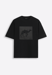 Signature “Camel” black cotton T-shirt, front side view on plain background – East Vibe